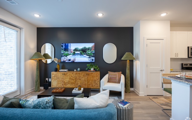 a living room with a couch and a table